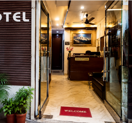 Hotel Himalaya room with comfortable bed, air conditioning, modern amenities, and a clean interior.